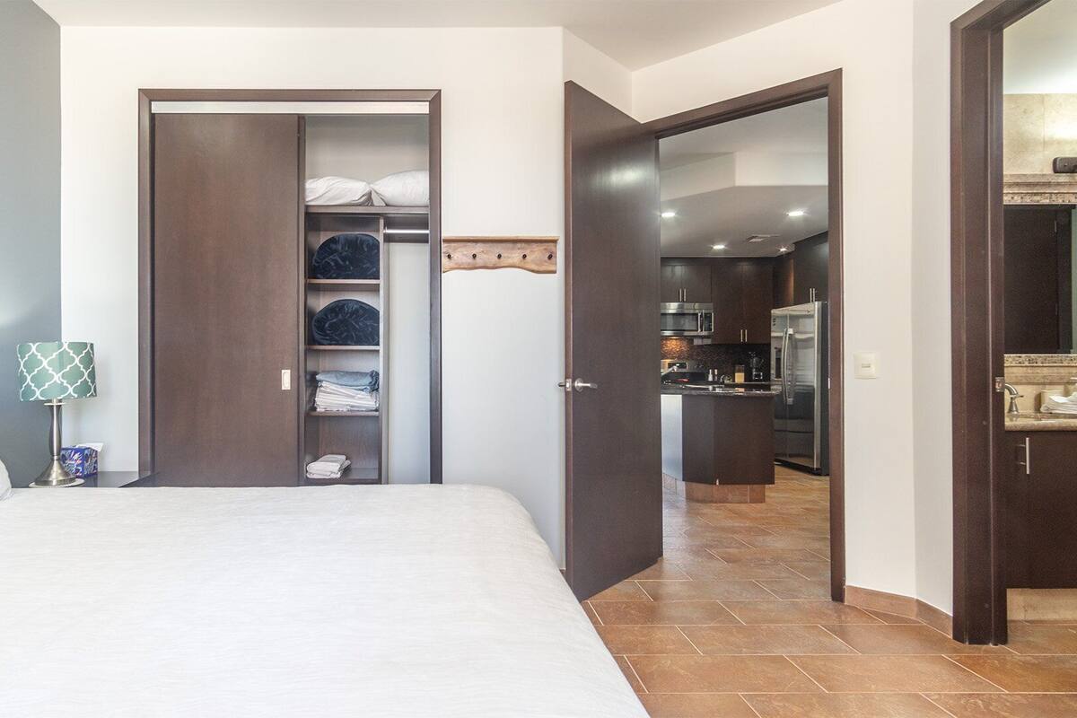 Condo, 1 King Bed with Sofa bed, Balcony, Ocean View (Las Palomas Resort Cordoba 702) | 1 bedroom, iron/ironing board, individually decorated