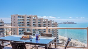 Condo, Multiple Beds, Balcony, Ocean View (Las Palomas Resort Cristal 1001) | Outdoor dining - Las Palomas Beach and Golf Resort (Puerto Peñasco)