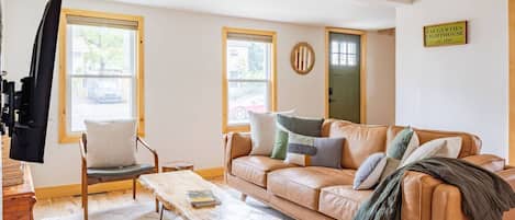 Televisión, chimenea, estéreo