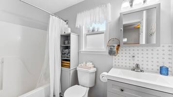 Hair dryer, towels, soap, toilet paper
