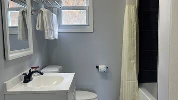 Superior Single Room | Bathroom | Hair dryer, towels, soap, shampoo