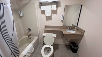 Deluxe Twin Room | Bathroom | Hair dryer, towels, soap, shampoo