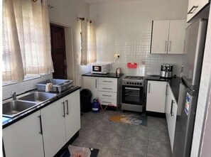 Een magnetron, een oven, een kookplaat