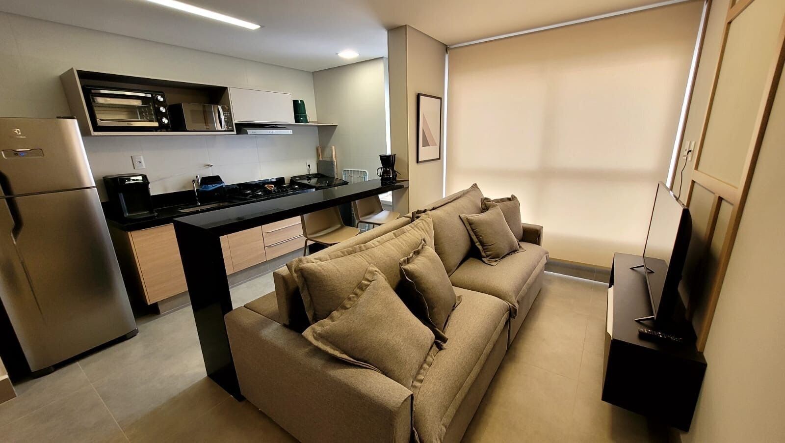 Apartamento básico | Área de estar | Smart TV 32 polegadas com canais digitais