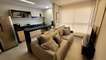 Apartamento básico | Área de estar | Smart TV 32 polegadas com canais digitais