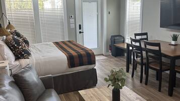 Standard Cabin, Courtyard View | Living area | 55-inch Smart TV with digital channels, streaming services