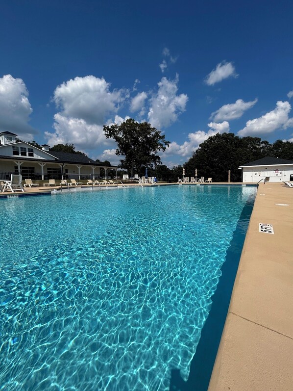 Seasonal outdoor pool, open 7:00 AM to 10:00 PM, pool umbrellas