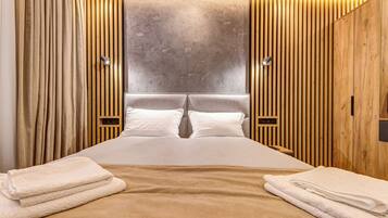 Premium bedding, memory foam beds, desk, laptop workspace