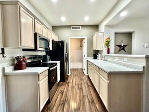 Fridge, microwave, oven, stovetop