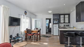 Fridge, microwave, toaster, cookware/dishes/utensils