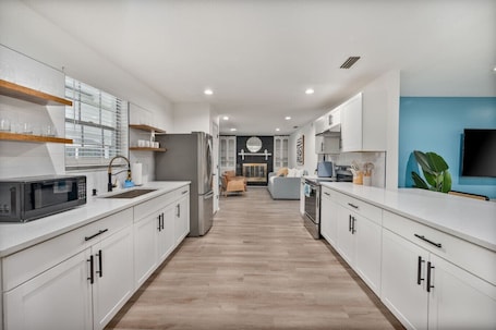 Fridge, microwave, oven, stovetop. Sunny Lakeside Retreat w/ Pool + Firepit