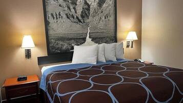 Desk, laptop workspace, blackout drapes, iron/ironing board