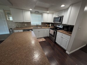 Microwave, oven, stovetop, dishwasher - Family 2BR Oasis w/Private Pool & HDTV, PAWsitive (Port Richey)