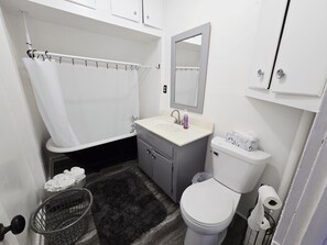 Shower, towels, soap, toilet paper