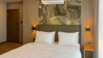 In-room safe, laptop workspace, blackout drapes, soundproofing