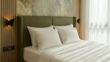 In-room safe, laptop workspace, blackout drapes, soundproofing