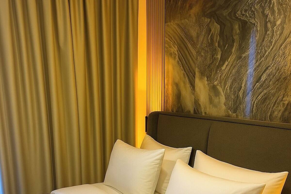 In-room safe, laptop workspace, blackout drapes, soundproofing