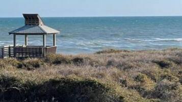 On the beach, sun loungers