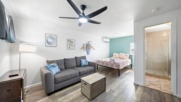 1 bedroom, desk, iron/ironing board, travel crib