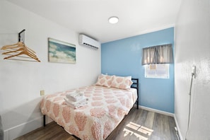 1 bedroom, desk, iron/ironing board, travel cot