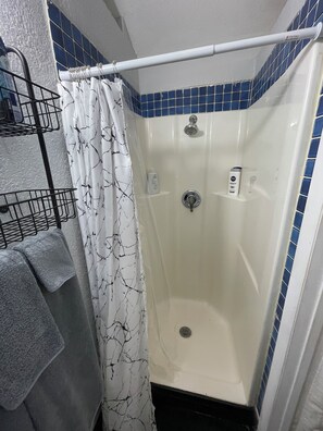 Shower, towels, soap, shampoo