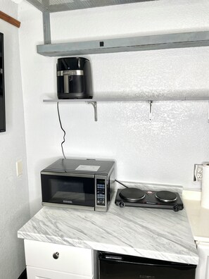 Fridge, microwave, toaster, cookware/dishes/utensils
