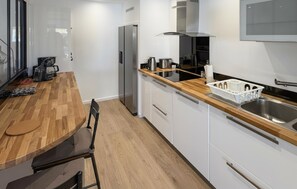 Een koelkast, een oven, een vaatwasser