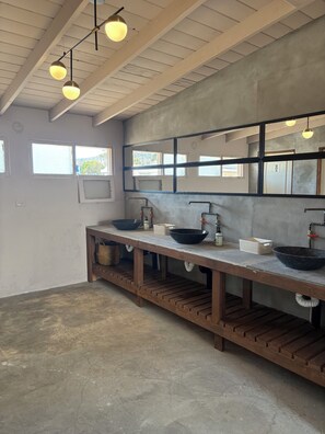 Shower, towels, soap, toilet paper