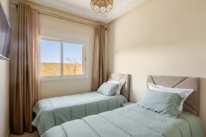 2 habitaciones, tabla de planchar con plancha, wifi y ropa de cama