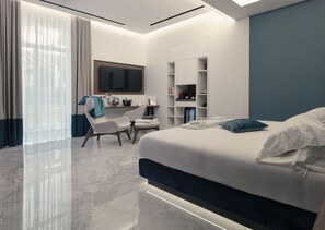 Standard Room, Balcony, City View | In-room safe, desk, laptop workspace, blackout drapes