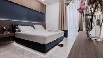 Egyptian cotton sheets, premium bedding, minibar, in-room safe