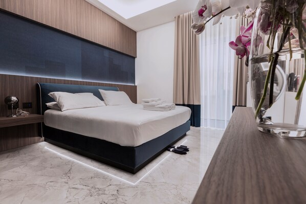 Standard Room, Balcony, City View | In-room safe, desk, laptop workspace, blackout drapes