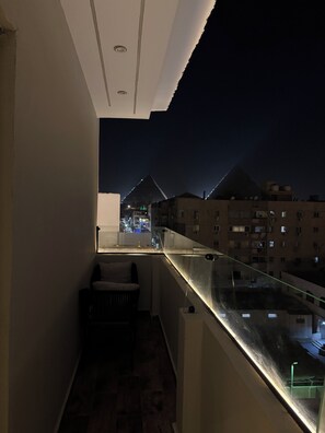 Deluxe Triple Room, Lanai, Desert View | Terrace/patio