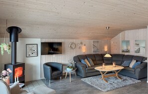 Una Smart TV, una chimenea