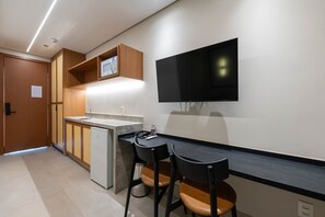 Mini-fridge, microwave, cookware/dishes/utensils