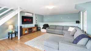 Smart TV, fireplace, DVD player, books