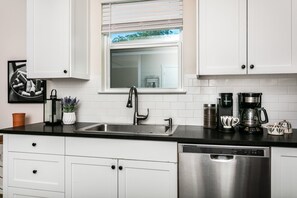 Fridge, microwave, dishwasher, coffee/tea maker