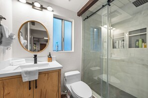 Shower, hair dryer, towels