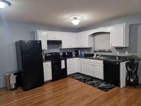 Fridge, microwave, oven, stovetop. The E-Town Retreat 2BR townhouse close to Downtown