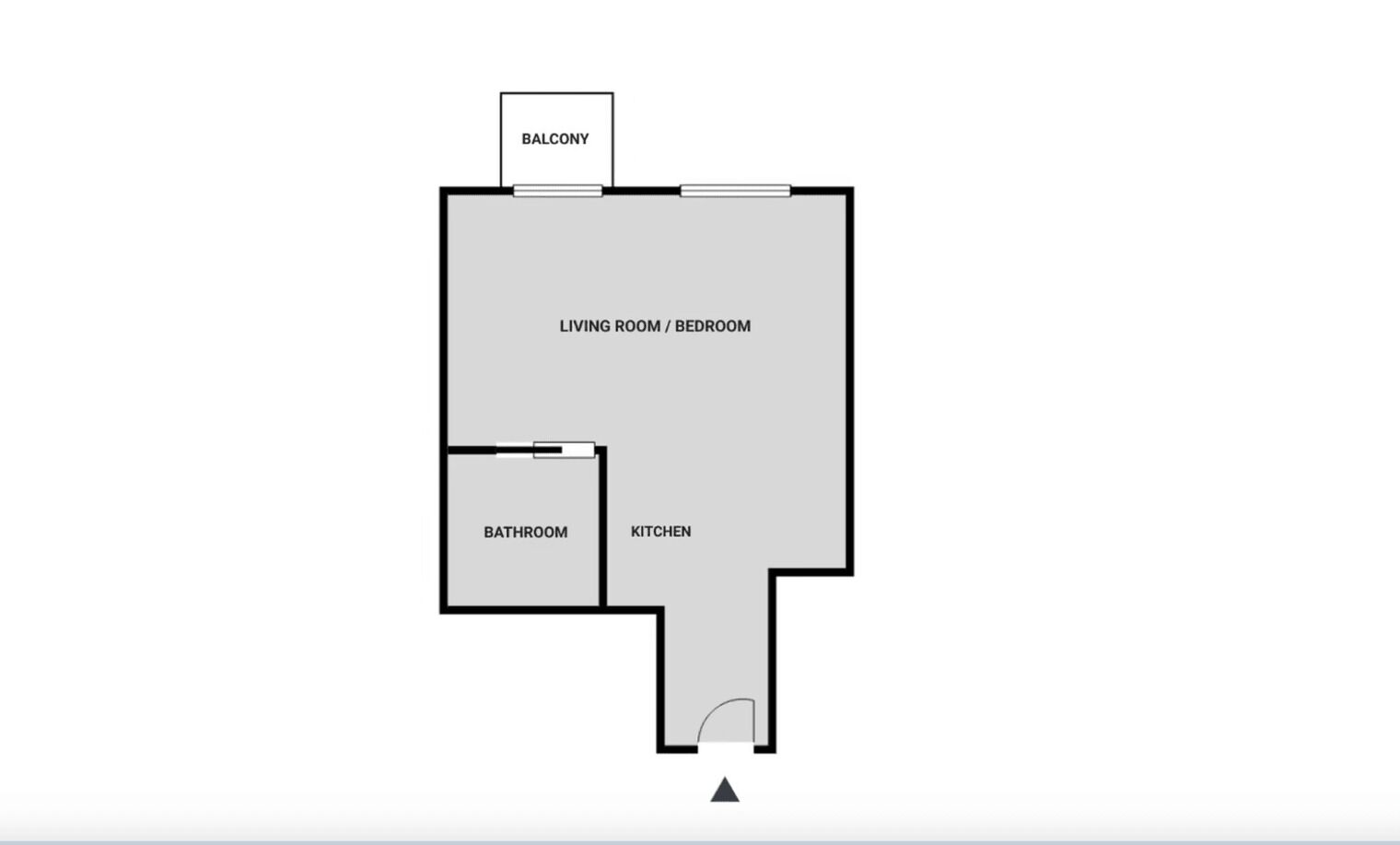 Een plattegrond met een woon-/slaapkamer, keuken, badkamer en balkon.