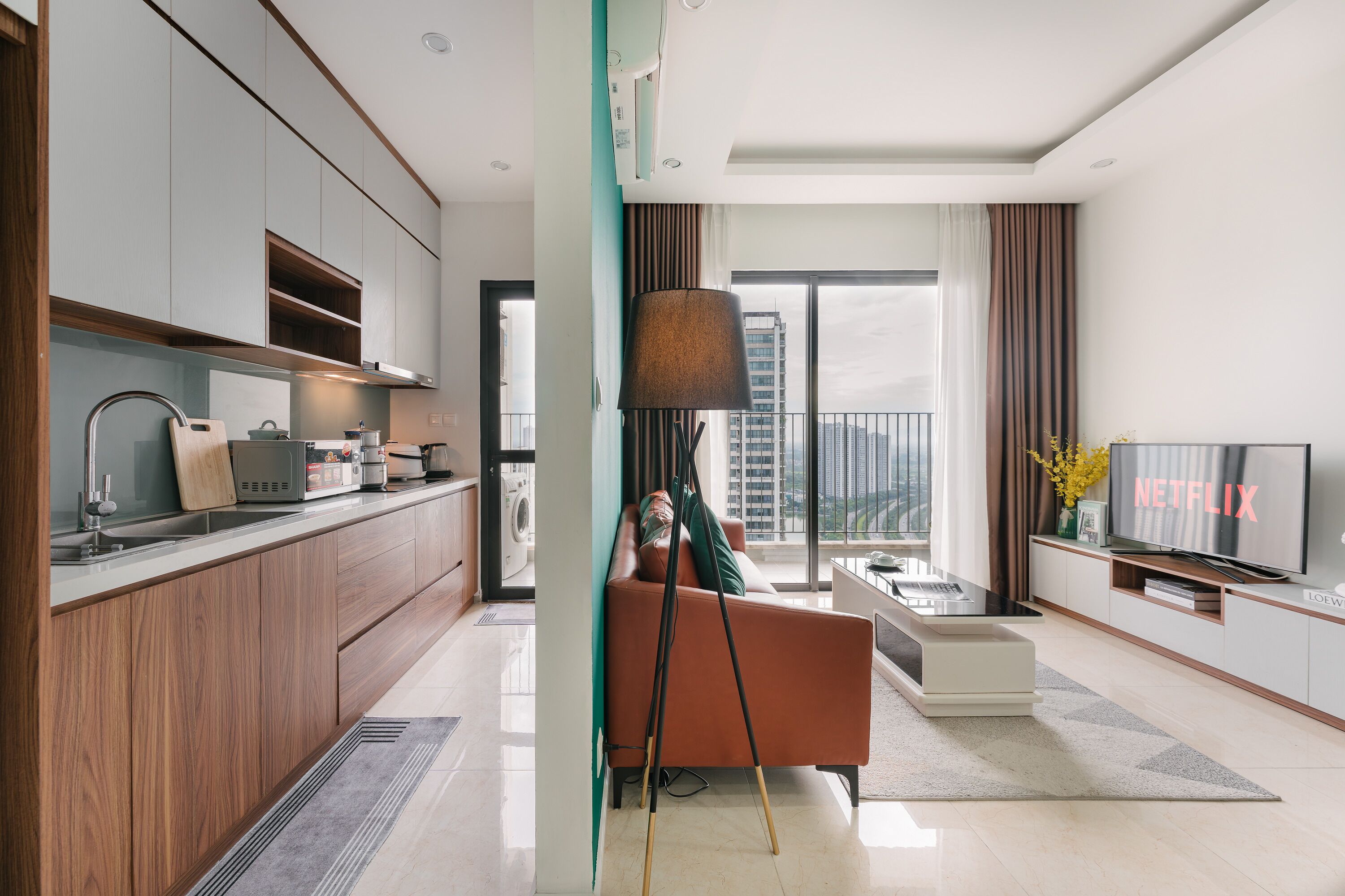 Deluxe Apartment, Balcony, City View | Living room | 60-inch Smart TV with satellite channels, Netflix, streaming services