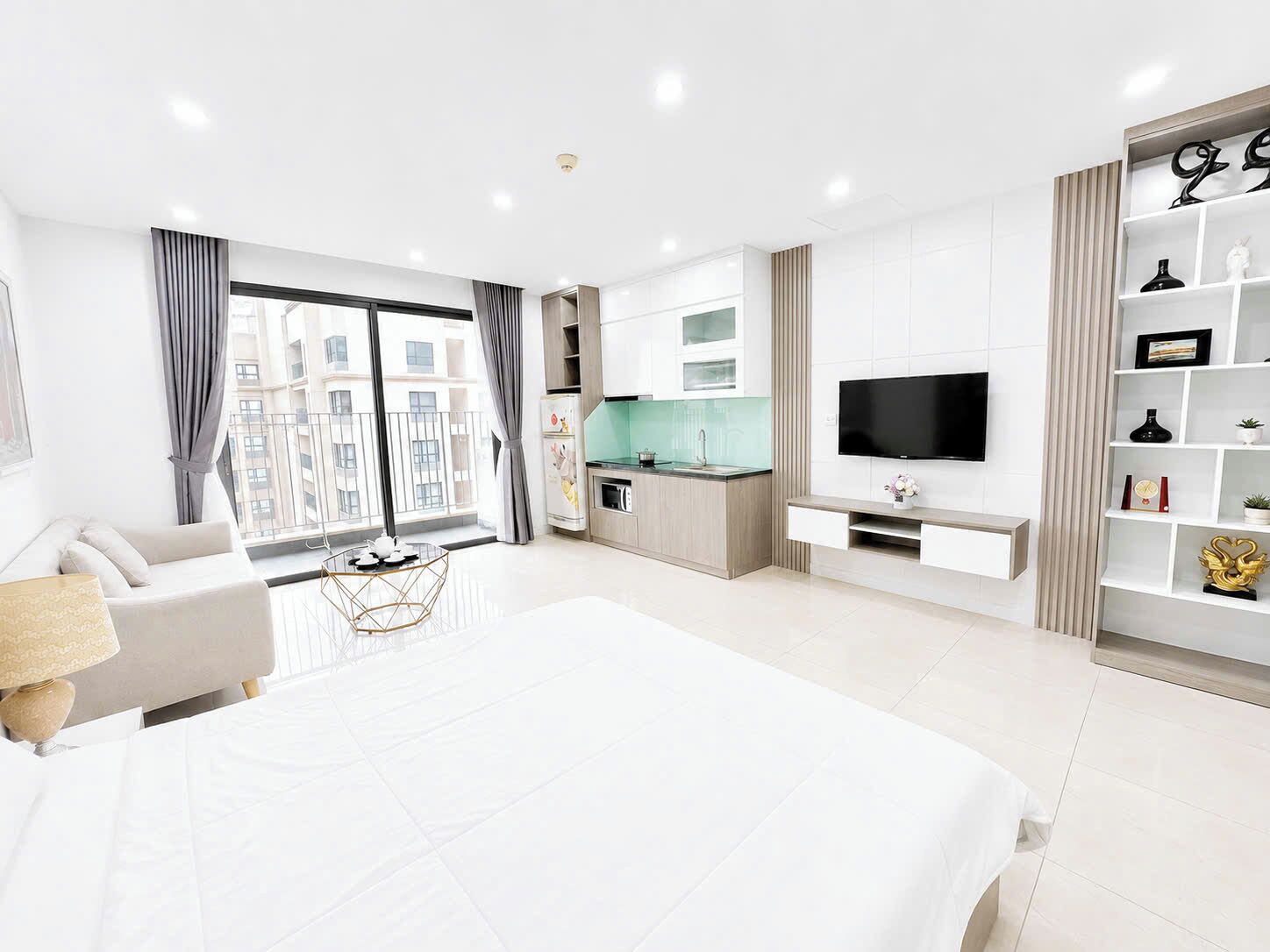 Panoramic Studio, Balcony, City View | Living area | 60-inch Smart TV with satellite channels, Netflix, streaming services