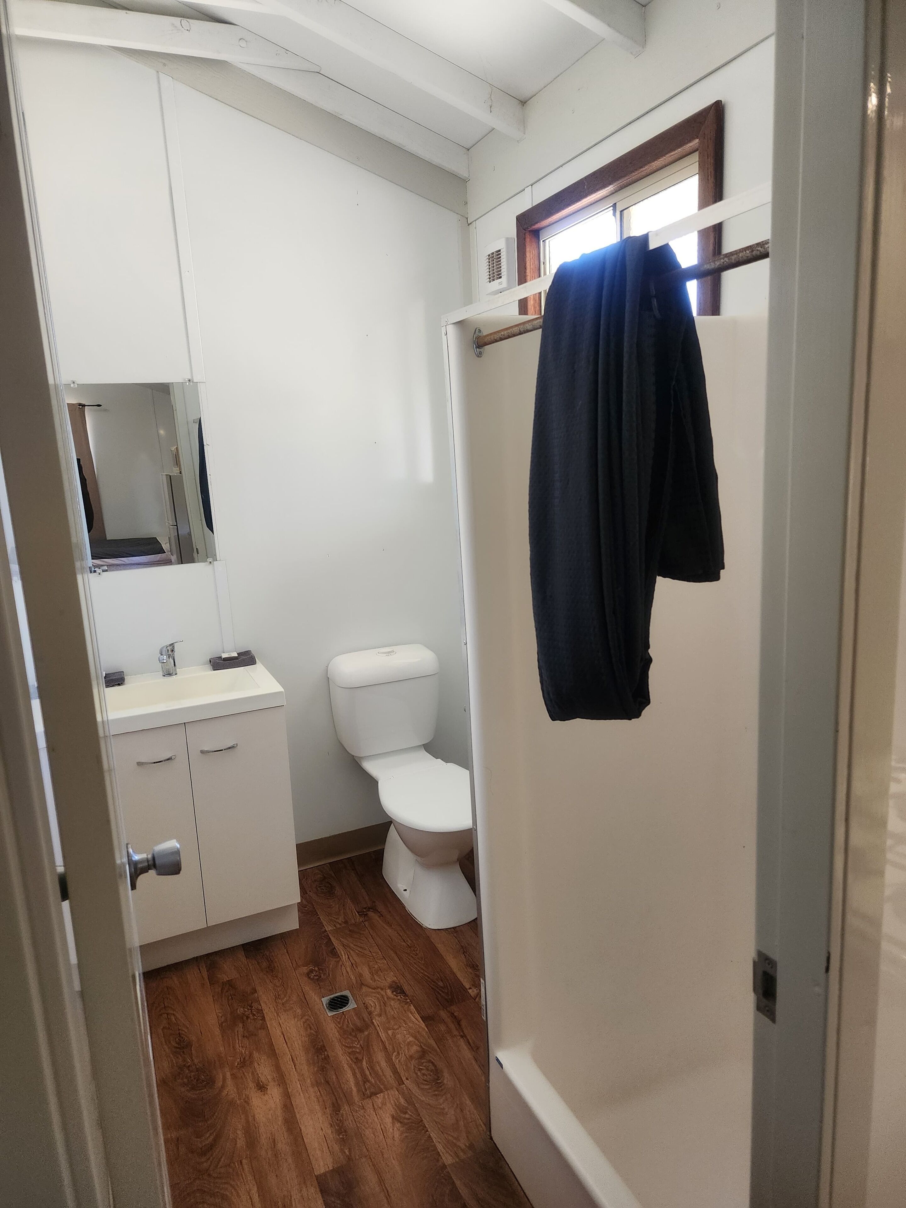Shower, towels, soap, toilet paper
