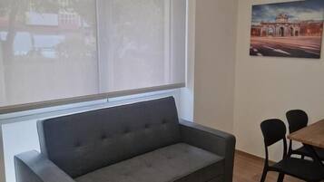 Apartamento 110 | Living area | TV