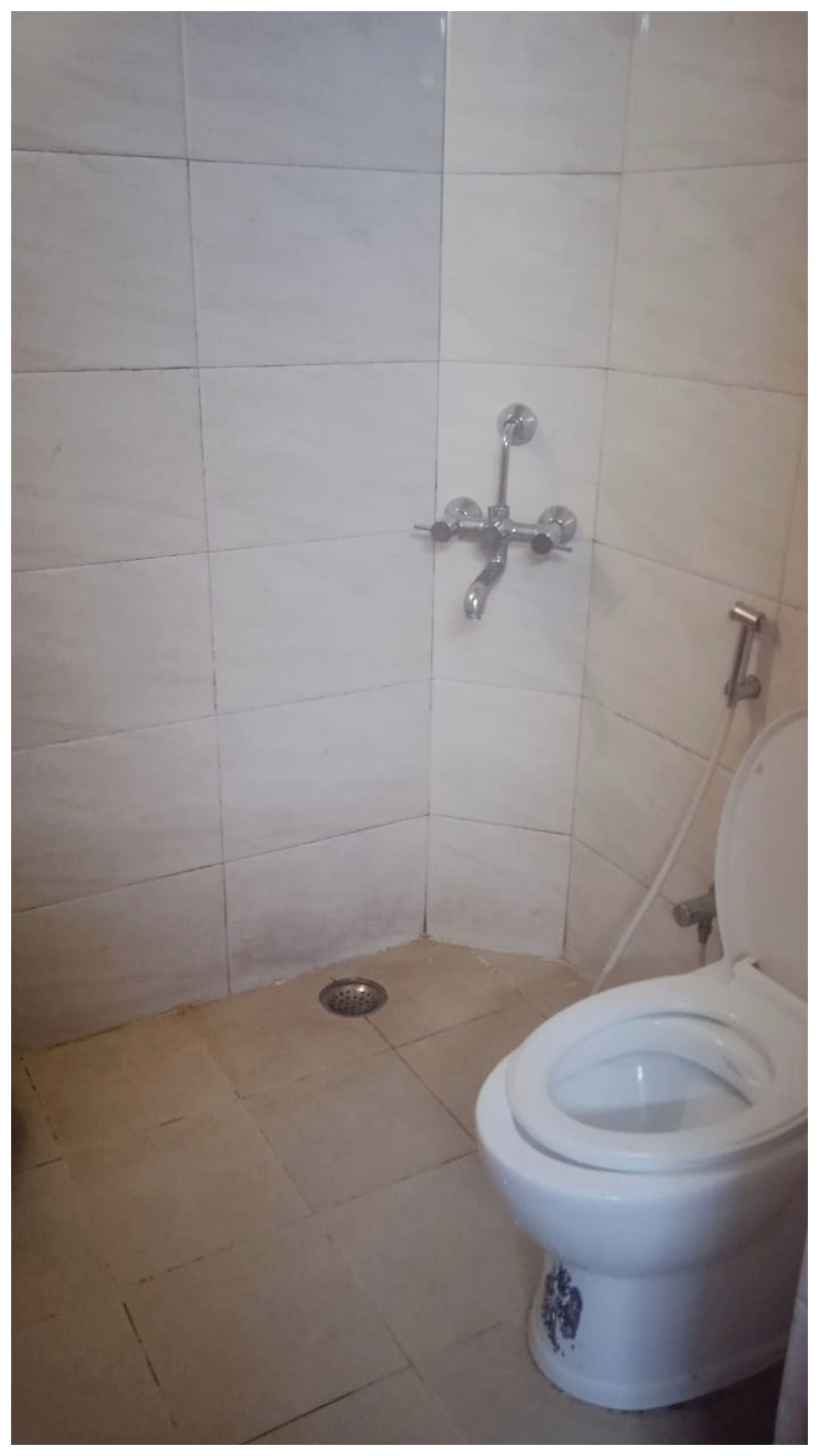 Shower, rainfall showerhead, slippers, towels