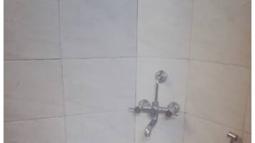Shower, rainfall showerhead, towels, soap