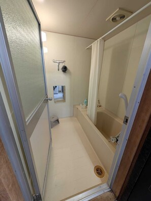 Hair dryer, towels, soap, toilet paper