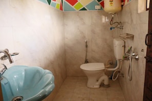 Slippers, towels, soap, toilet paper