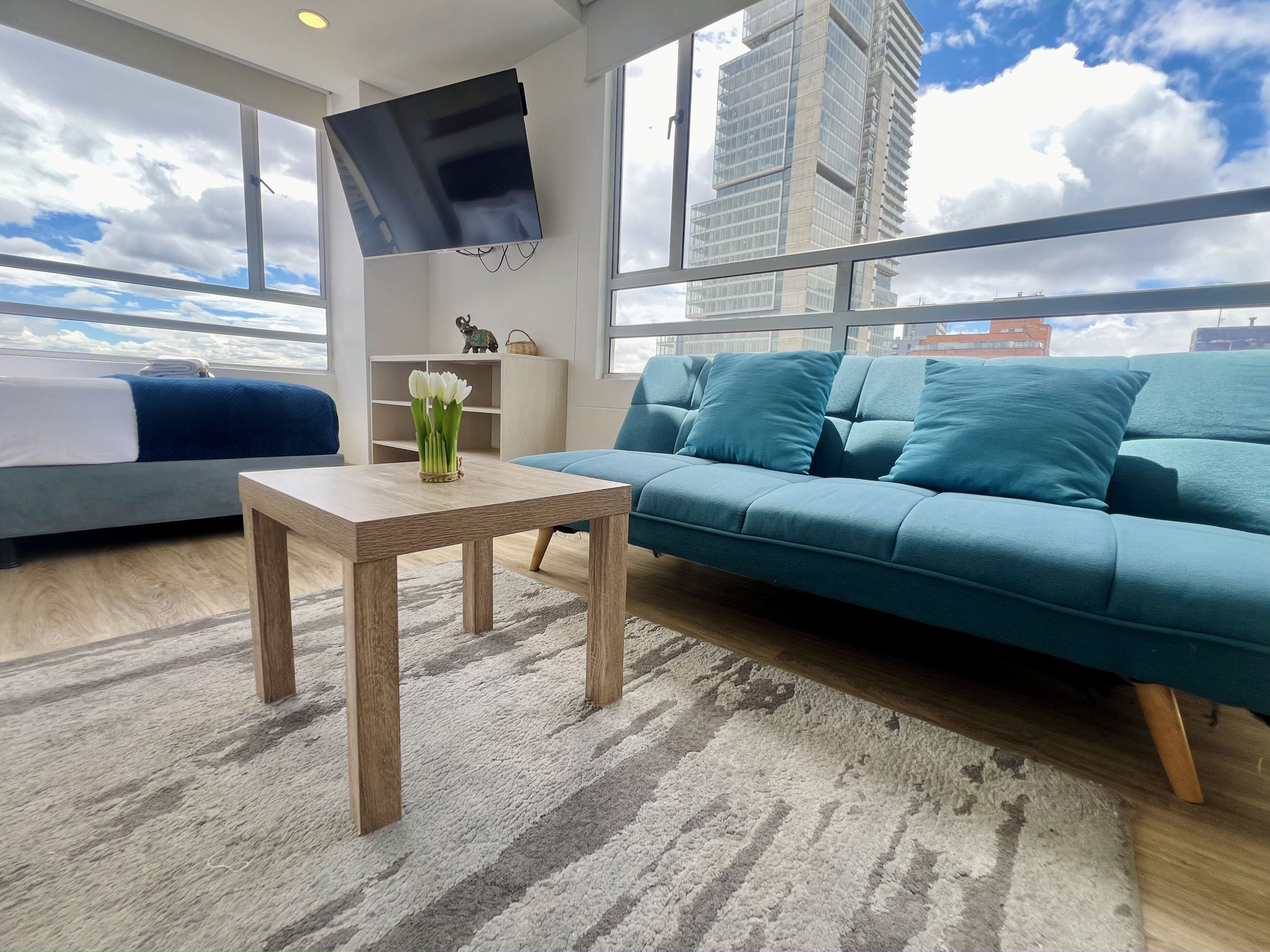 Loft conforto, vista para a cidade | Área de estar