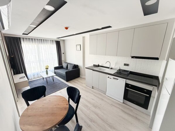 Superior Apartment, Kitchen | Living area | 43-inch LED TV with satellite channels, Netflix, streaming services